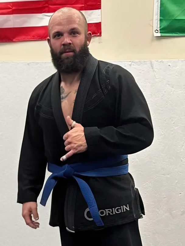 Assistant wrestling coach Andrew Riddle
