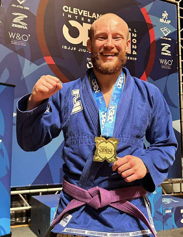 Coach Josh Murray wearing his gold medal at the IBJJF Cleveland International Open